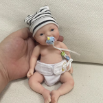 Realistic Palm Sized Mini Reborn Doll Noah - 7-Inch Smiling Silicone Baby