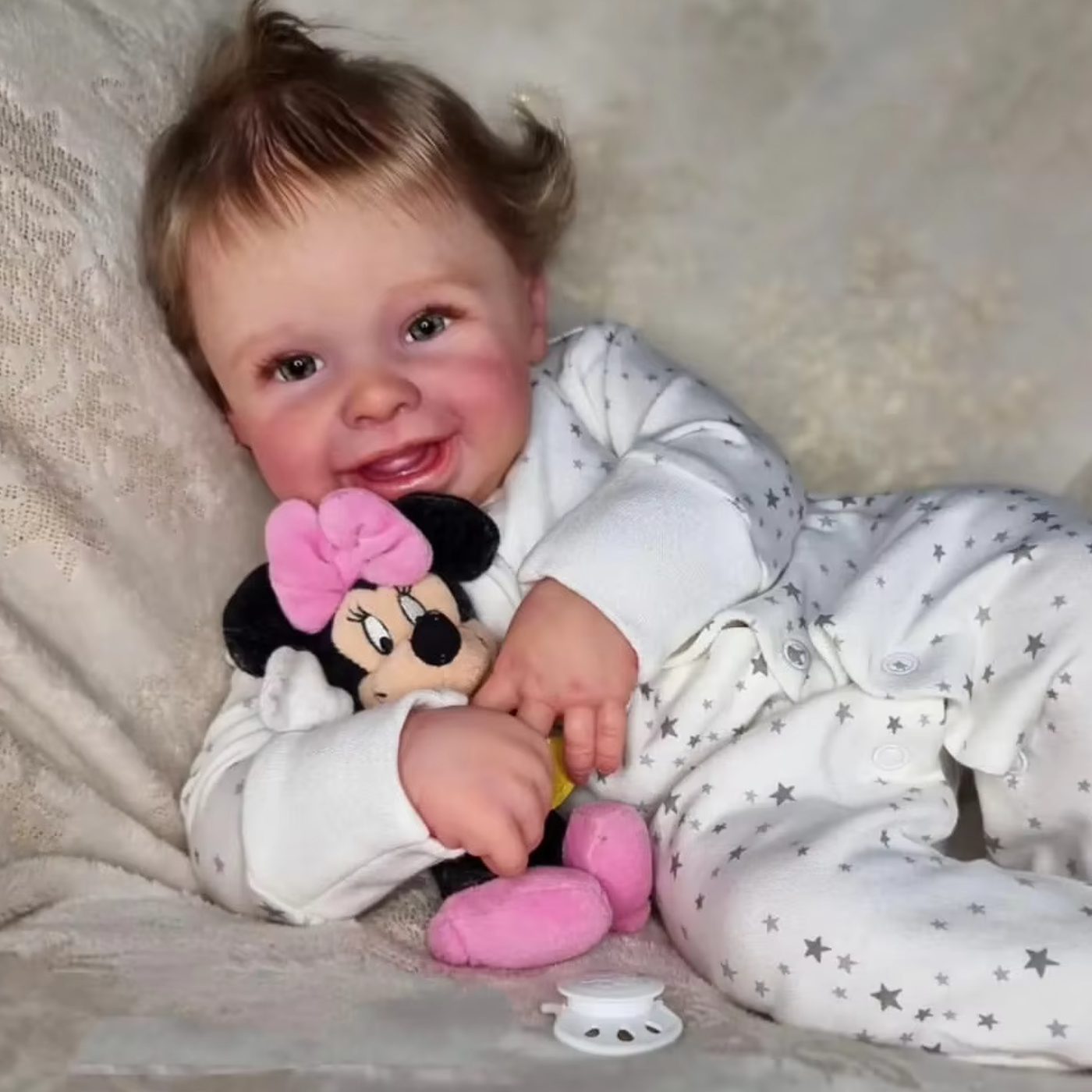 Millie Joy – 22-Inch Smiling Reborn Baby Girl Doll with Blue Eyes and Hand-Rooted Hair