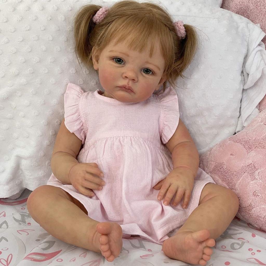 reborn toddler doll with detailed hands feet and painted skin tones